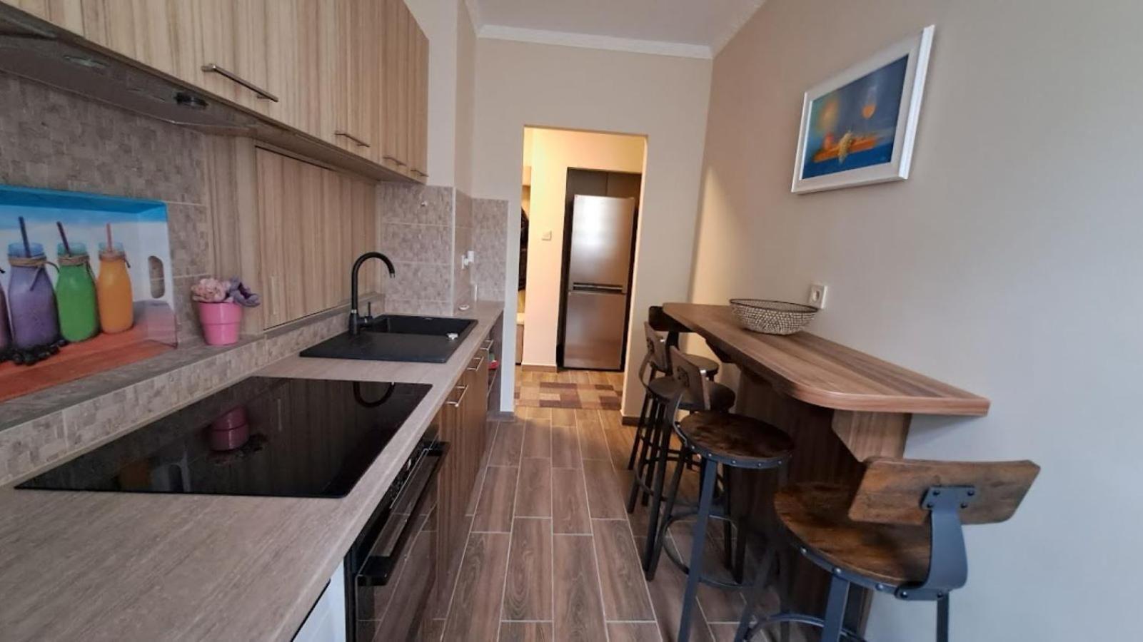 Szilfak City Apartman ไฮจ์ดุสโซบอสโล ภายนอก รูปภาพ